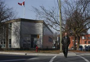 Samer Majzoub, president of the Canadian Muslim Forum, walks down a street outside his office in Montreal, November 18, 2015. REUTERS/Christinne Muschi